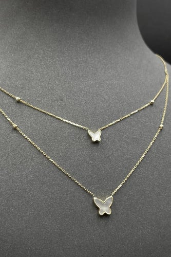 سلسال ذهب عيار 18 فراشة دورين مع صدف ابيض وزن 2.4...