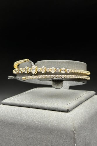 اسوارة مع خاتم ذهب عيار 18 تصميم الماسي أنيق وزن 1...