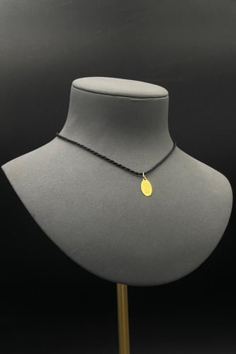 سبيكة ذهب وزن 1 جرام عيار 24 شكل بيضاوي مع عروه