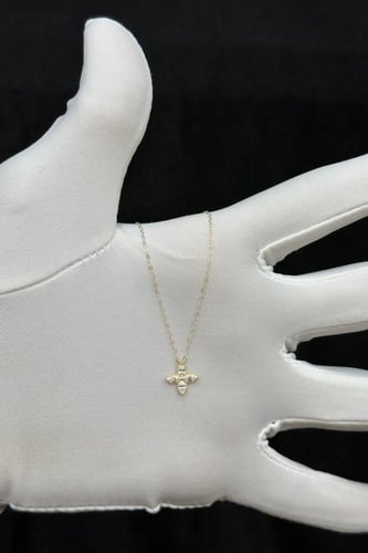 سلسال ذهب ناعم عيار 18 زهرة بتصميم الماس وزن 0.6 ج...