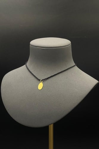 سبيكة ذهب وزن 1 جرام عيار 24 شكل بيضاوي مع عروه