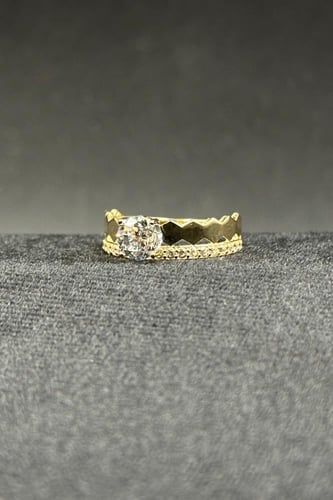 خاتم ذهب عيار 18 بتصميم خلية مع فص سوليتير وزن من...