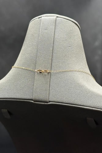 عقد مجدول مع وردة ذهب صافي عيار 21 وزن 0.6 جرام