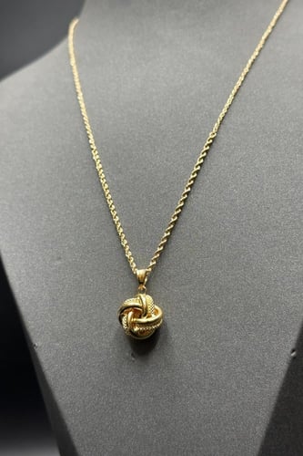 عقد مجدول مع مكرونة ذهب صافي عيار 18 وزن 1.9 جرام