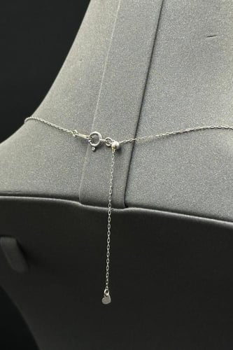 عقد الماس وزن الذهب : 1.44 جرام وزن الألماس : 0.11...