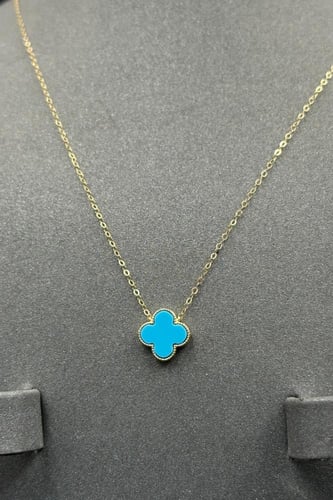 طقم وردة ذهب مع صدف فيروزي عيار 18 وزن من 2.7 الى...