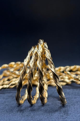 بناجر ذهب صافي بتصميم امواج عيار 21 وزن من 5.9 الى...