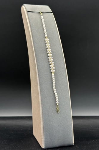 اسوارة لؤلؤ مع ذهب بالمنتصف عيار 18 وزن 1 جرام