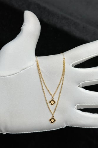 عقد دورين مجدول مع وردة ذهب صافي عيار 21 وزن من 0....