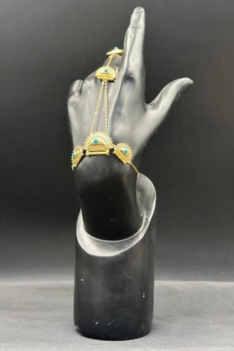 كف ذهب عيار 21 براشي بحريني مع صدف فيروزي وزن من 6...