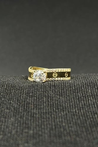 خاتم ذهب عيار 18 بتصميم انيق مع فص سوليتير وزن من...