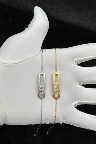 اسوارة مستطيل ذهب تصميم الماس عيار 18 وزن من 4.9 ا...