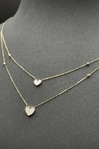 عقد قلب دورين ذهب مع صدف ابيض عيار 18 وزن من 2.2 ا...