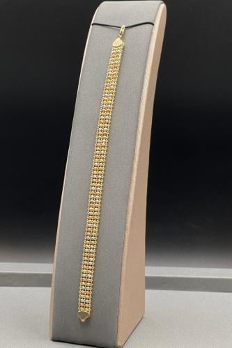 اسوارة ذهب عيار 18 بتصميم كور ذهبية صافية وزن 12.9...