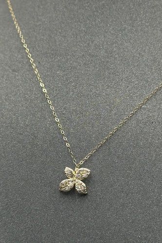 طقم اطفال وردة ذهب تصميم الماس عيار 18 وزن من 2 ال...