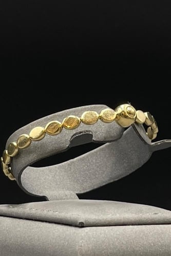 اسوارة مع خاتم دوائر ذهب عيار 18 بوزن 10.1 جرام