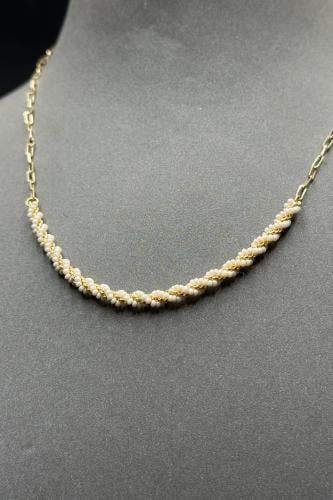 عقد مجدول ذهب مع لؤلؤ عيار 18 وزن 1.62 جرام