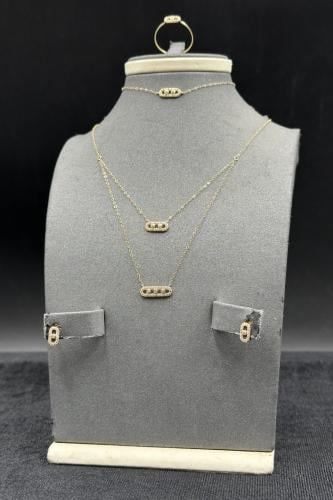 طقم دورين مستطيل ذهب تصميم الماس عيار 18 وزن 2.3 ج...