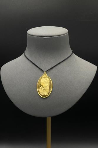 سبيكة ذهب وزن 20 جرام عيار 24 شكل بيضاوي مع عروه