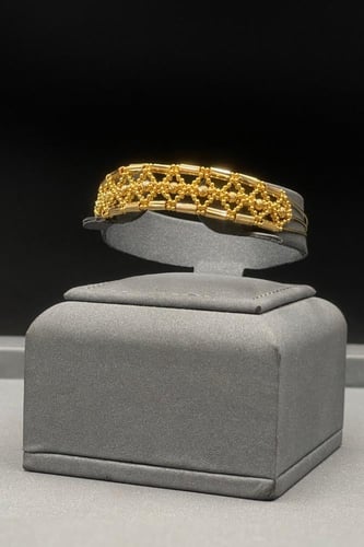 اسوارة مع خاتم ذهب عيار 21 صافي بتصميم كور وزن 13....