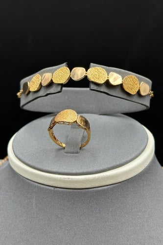 طقم ذهب صافي عيار 21 وزن 24.7 جرام