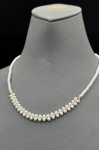 عقد لؤلؤ مع ذهب بالمنتصف عيار 18 وزن 1.1 جرام