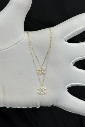 عقد شكل C دورين ذهب تصميم الماس عيار 18 وزن من 0.7...