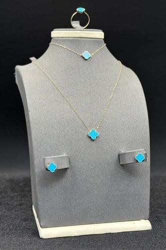 طقم وردة ذهب مع صدف فيروزي عيار 18 وزن من 2.7 الى...