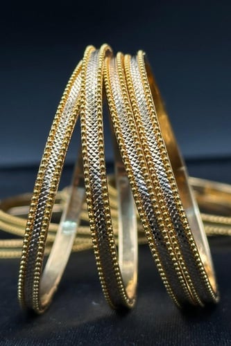 بناجر الوعد ذهب صافي بتصميم فاخر عيار 21 بأوزان مت...