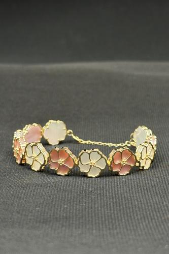 اسوارة اطفال ورد ذهب مع صدف ملون عيار 18 وزن من 7....