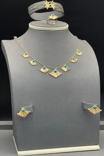 طقم رموش ذهب مع صدف فيروزي عيار 21 وزن من 8.3 الى...