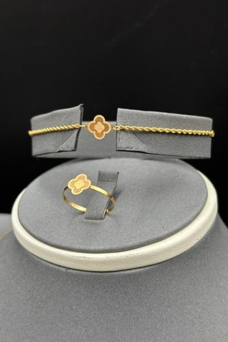 طقم مجدول مع وردة ذهب صافي عيار 21 وزن من 2.1 الى...