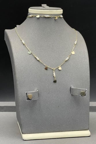 طقم اطفال قلب ذهب مع لؤلؤ عيار 18 وزن 4.9 جرام