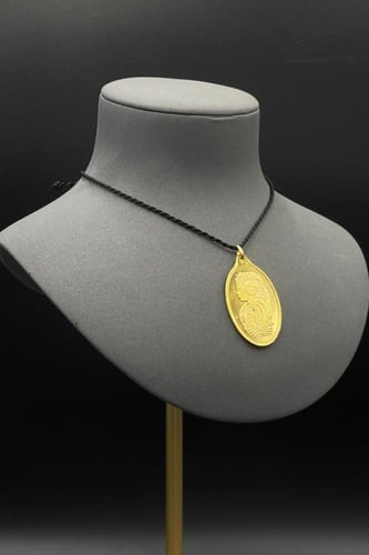 سبيكة ذهب وزن 20 جرام عيار 24 شكل بيضاوي مع عروه