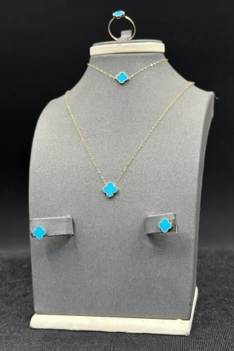 طقم وردة ذهب مع صدف فيروزي عيار 18 وزن من 2.7 الى...