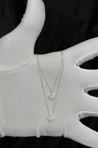 عقد وردة دورين ذهب تصميم الماس عيار 18 وزن من 0.9...