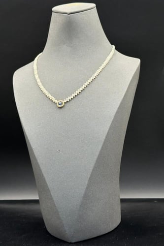 عقد لؤلؤ مع فص ملون مع ذهب عيار 18 وزن من 0.6 الى...