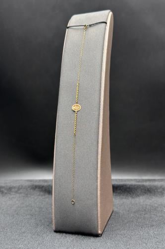 اسوارة ذهب عيار 21 بتصميم نص مجدول وزن 0.4 جرام