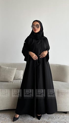 عباية عيد سوداء فاخرة مطرزة باللؤلؤ بتصميم فستان م...