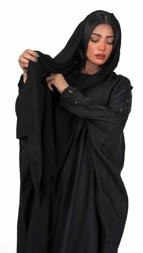 Black abaya with a Beshteer crystal on the sleeves