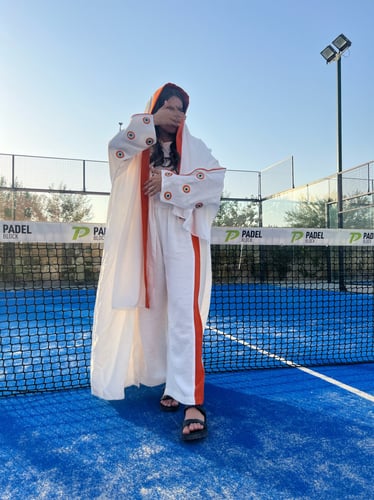 كريب بحريني مع تطريز عيون يدوي اورنج