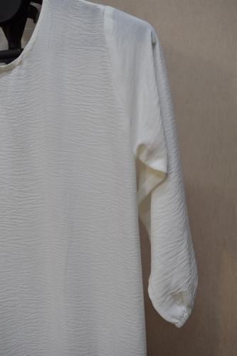 فستان داخلي للعبايات اللون أبيض أوف وايت