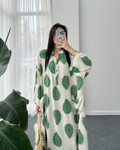 فستان قطن تركي يتميز بجيبه وملمسه الناعم