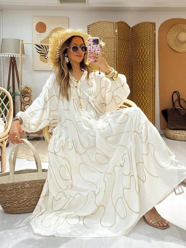 فستان قطن بتطريز ذهبي