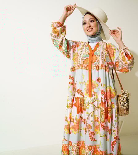 فستان أنيق بألوان ناعمة