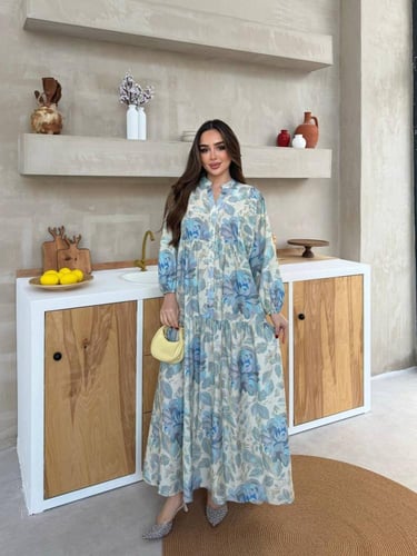 فستان أنيق بألوان ناعمة