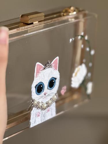 شنطة مناسبات شفافه مع قطة (في حال الطلب راح يتم ال...