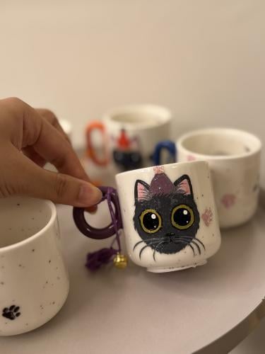 كوب مياو الاحتفال