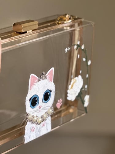 شنطة مناسبات شفافه مع قطة (في حال الطلب راح يتم ال...