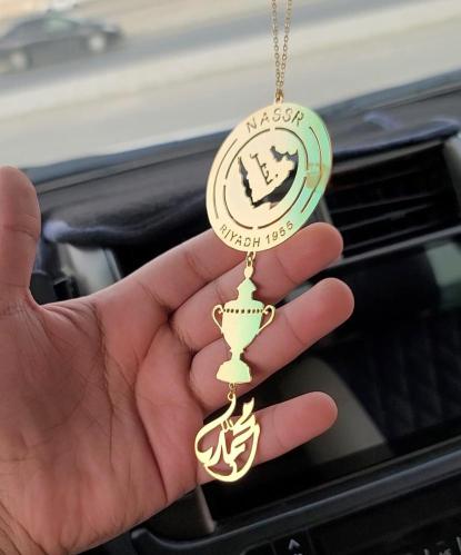 تعليقة نادي النصر بالاسم مع شعار الدوري
